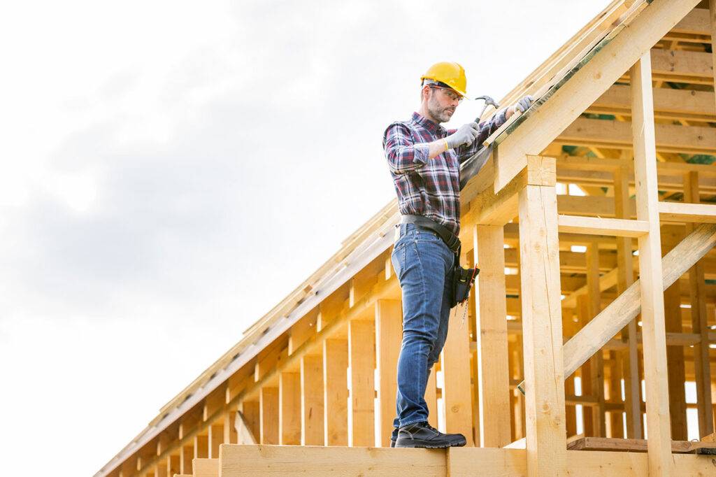 roofer-builder-working-on-roof-structure-at-constr-2021-08-28-15-56-12-LW5FL7H-a-1024x682